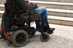 View of person's legs in a motorized wheelchair